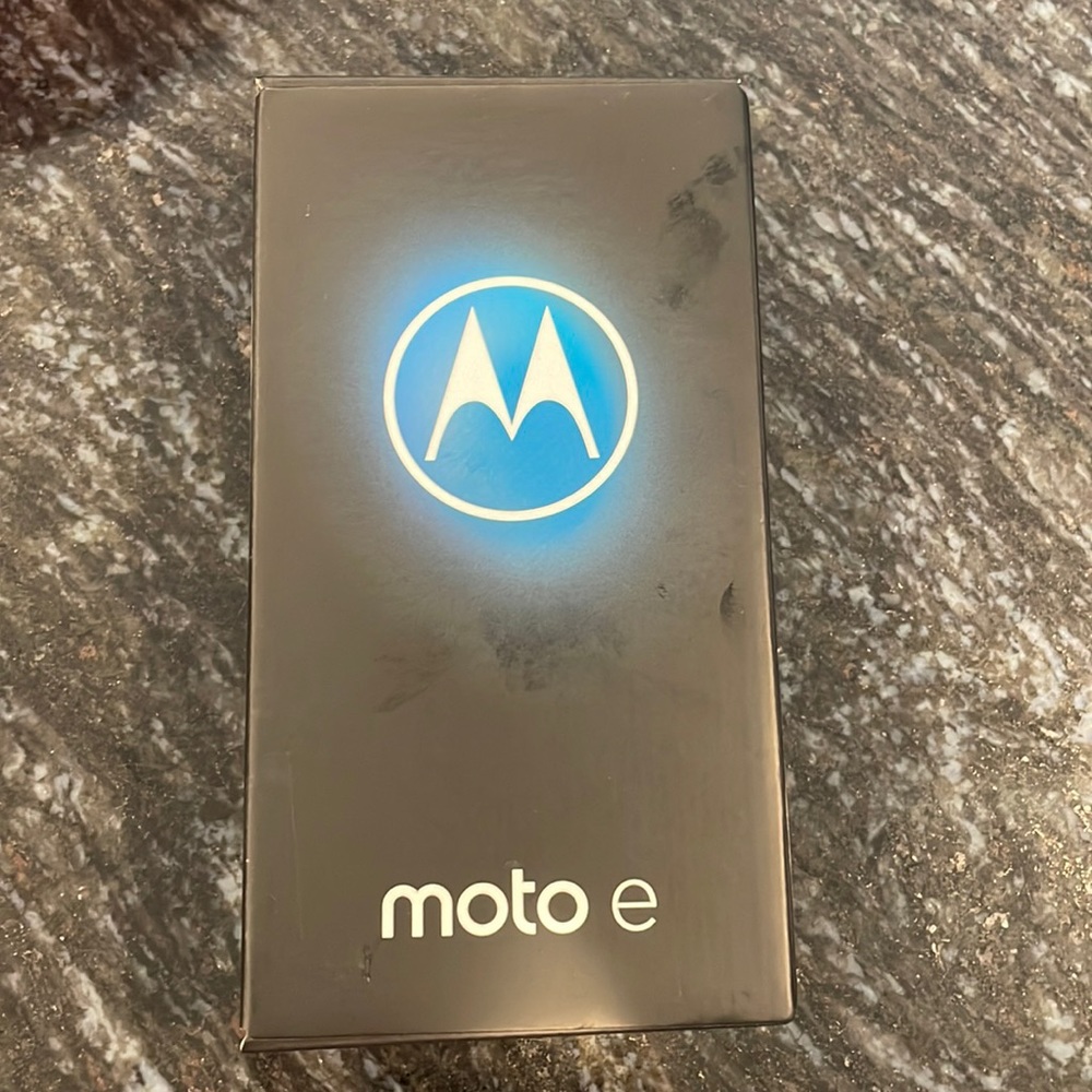 Moto E - Motorola smartphone. Brand new. Box still sealed by manufacturer.